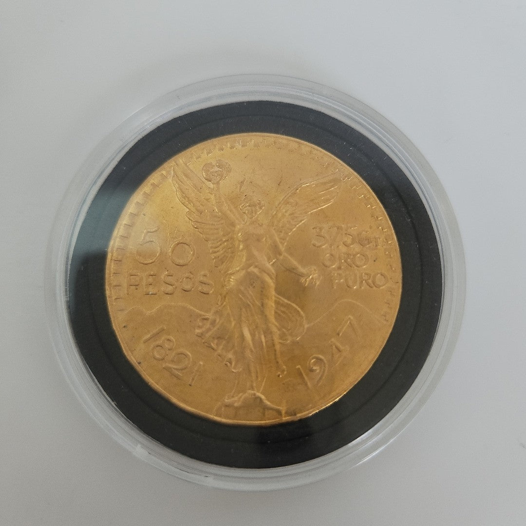 K1 41,60 GRMS - DTO. 0,00 GRMS - 21 K - AVALÚO 76003,20 * IDENTIFICACIÓN  MONEDA NOMINATIVA * MONEDAS PESOS  50 PESOS (SEMINUEVO)