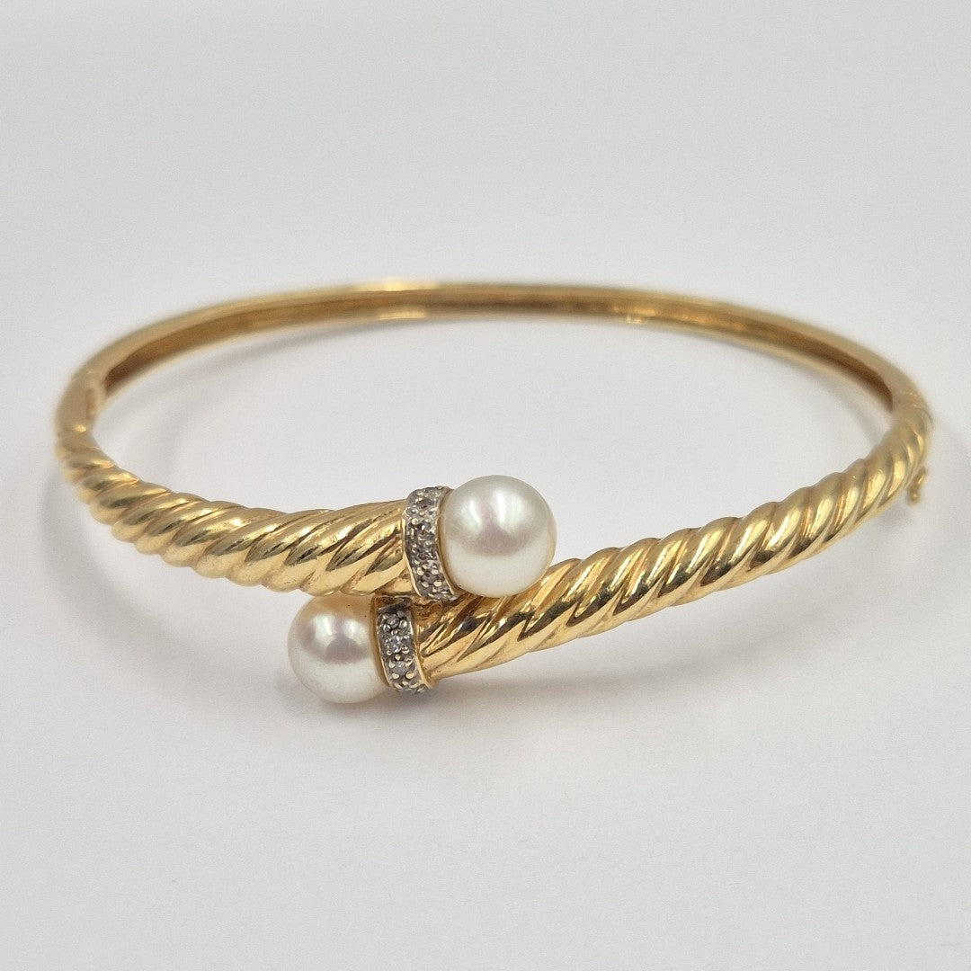 PULSERA RIGIDA. ORO. 10 K 16.9 GRMS (SEMINUEVO)