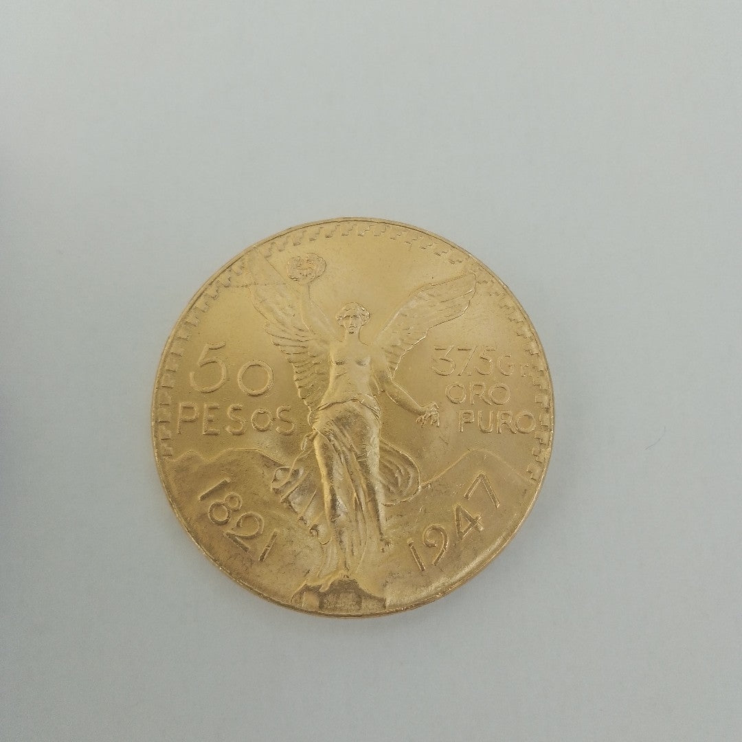 K1 41,60 GRMS - DTO. 0,00 GRMS - 21 K - AVALÚO 77126,40 * IDENTIFICACIÓN MONEDA NOMINATIVA * MONEDAS PESOS 50 PESOS (SEMINUEVO)