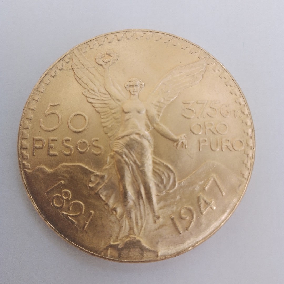 K1 41,60 GRMS - DTO. 0,00 GRMS - 21 K - AVALÚO 77126,40 * IDENTIFICACIÓN MONEDA NOMINATIVA * MONEDAS PESOS 50 PESOS (SEMINUEVO)