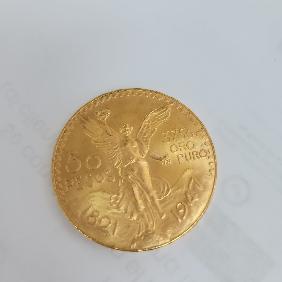 K1 41.6 GRMS - DESC. 0 GRAMOS - 21 K - AVALÚO 76377.6 * * IDENTIFICACIÓN MONEDA NOMINATIVA. * MONEDAS PESOS 50 PESO (SEMINUEVO)