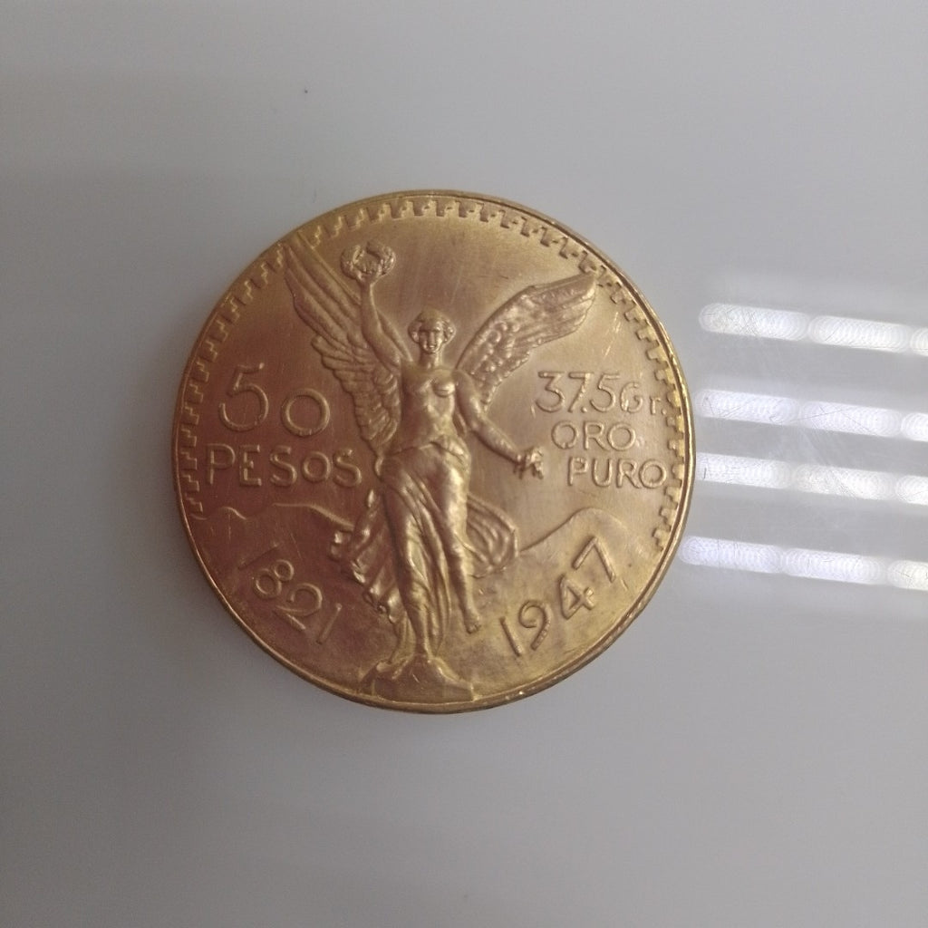 K1 41,60 GRMS - DTO. 0,00 GRMS - 21 K - AVALÚO 76003,20 * IDENTIFICACIÓN MONEDA NOMINATIVA * MONEDAS PESOS 50 PESOS (SEMINUEVO)