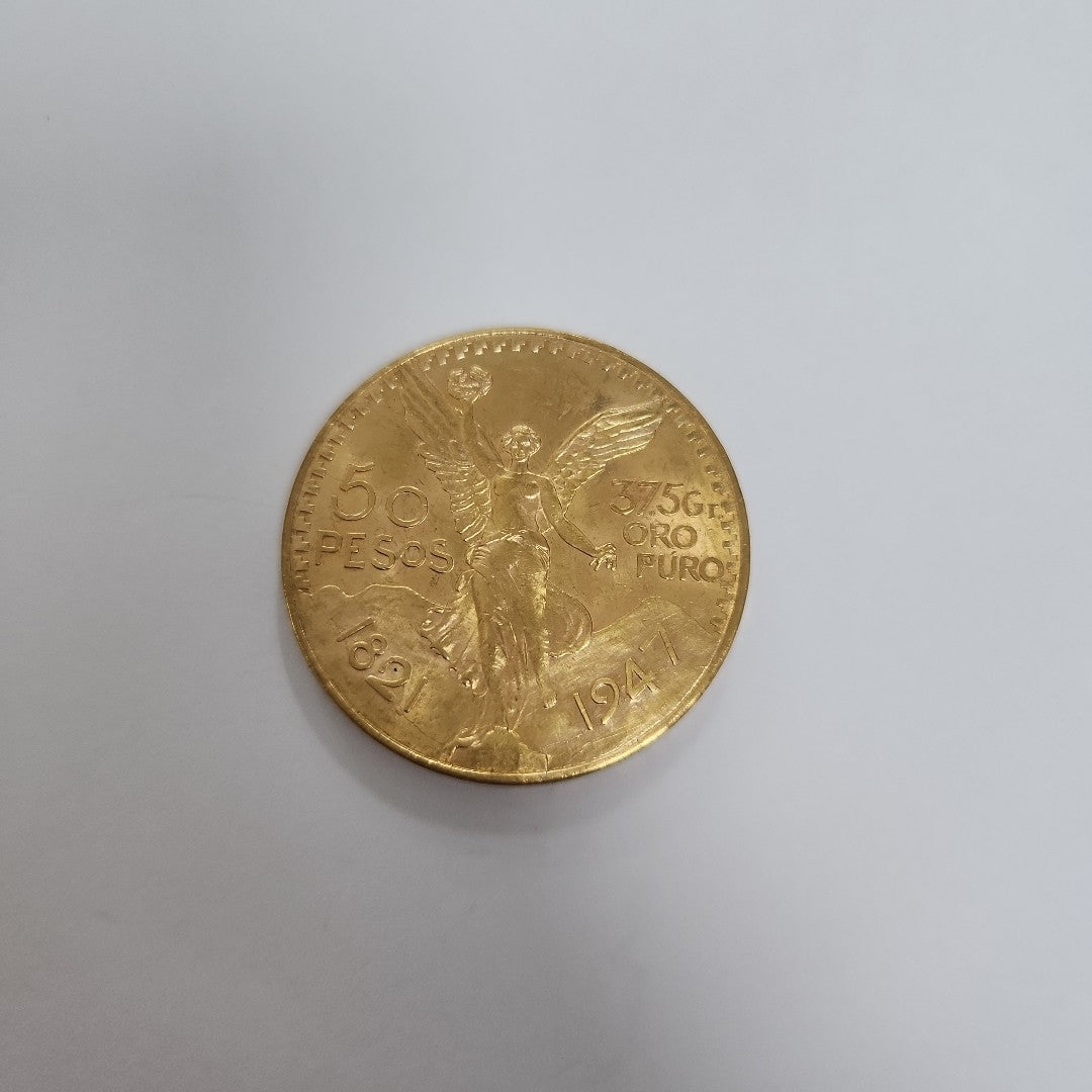 K1 41.6 GRMS - DESC. 0 GRAMOS - 21 K - AVALÚO 76377.6 * * IDENTIFICACIÓN MONEDA NOMINATIVA. * MONEDAS PESOS 50 PESO (SEMINUEVO)