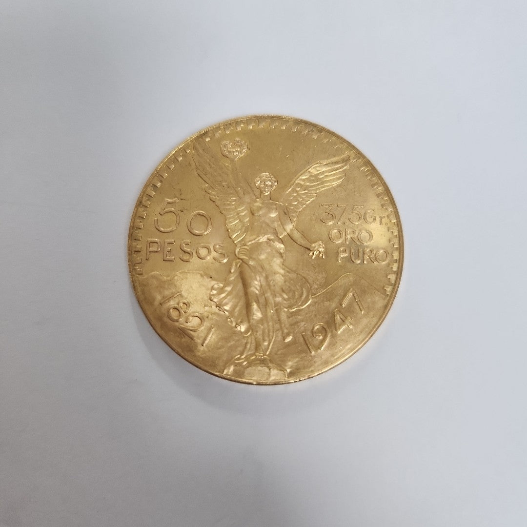 K1 41.6 GRMS - DESC. 0 GRAMOS - 21 K - AVALÚO 77126.4 * * IDENTIFICACIÓN MONEDA NOMINATIVA. * MONEDAS PESOS 50 PESO (SEMINUEVO)