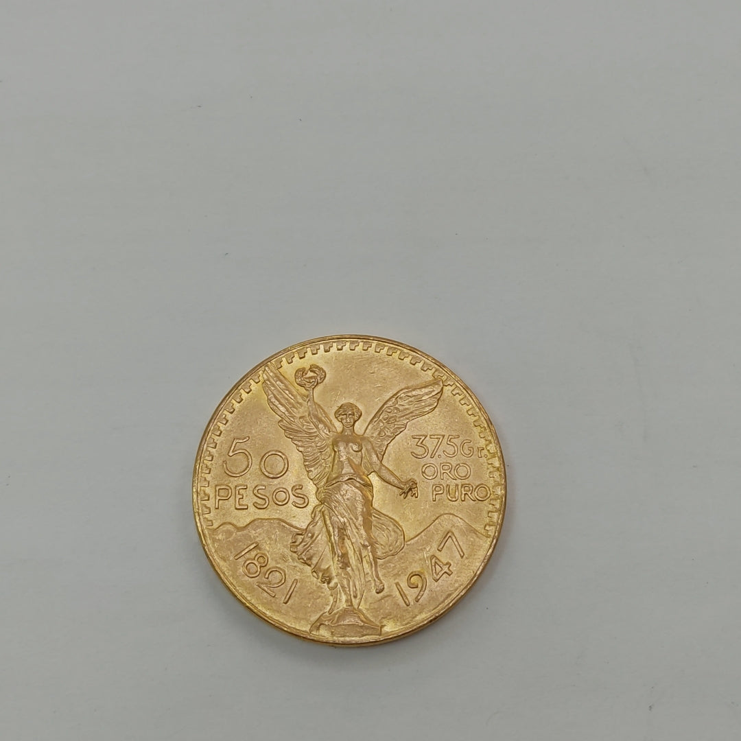 K1 41,60 GRMS - DTO. 0,00 GRMS - 21 K - AVALÚO 77126,40 * IDENTIFICACIÓN MONEDA NOMINATIVA * MONEDAS PESOS 50 PESOS (SEMINUEVO)
