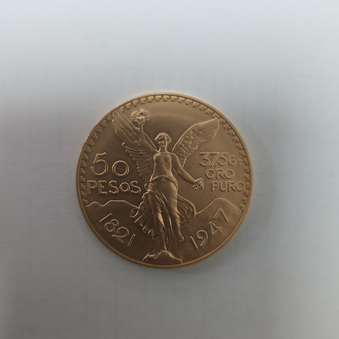 K1 41,60 GRMS - DTO. 0,00 GRMS - 21 K - AVALÚO 78260,00 * IDENTIFICACIÓN MONEDA NOMINATIVA * MONEDAS PESOS 50 PESOS (SEMINUEVO)