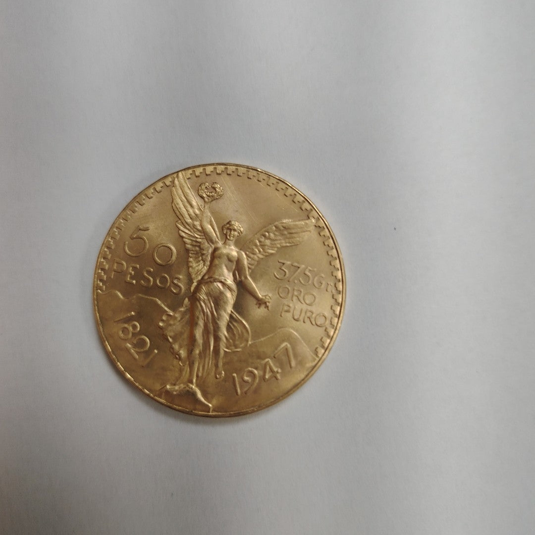 K1 41.6 GRMS - DESC. 0 GRAMOS - 21 K - AVALÚO 77126.4 * * IDENTIFICACIÓN MONEDA NOMINATIVA. * MONEDAS PESOS 50 PESO (SEMINUEVO)