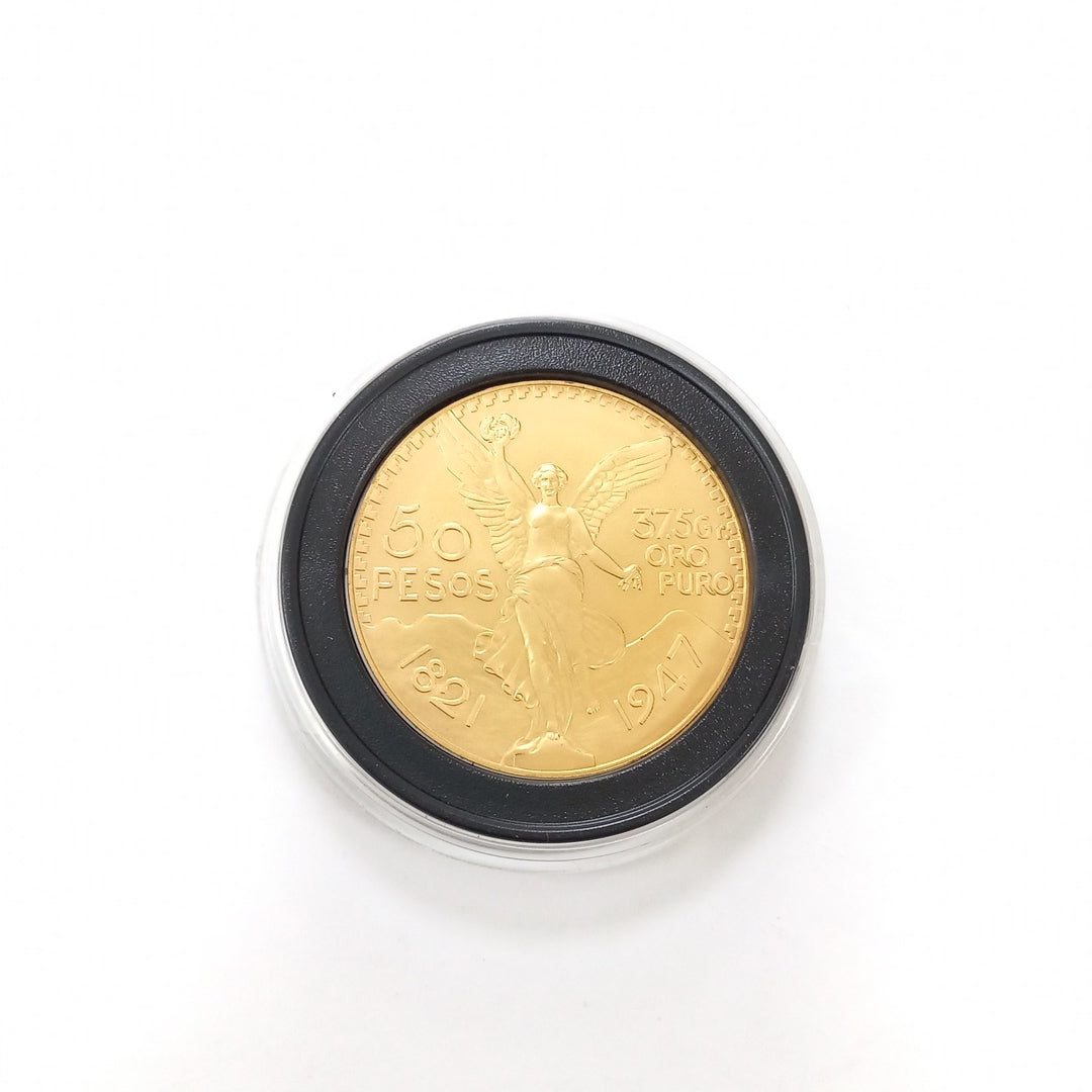 K1 41.6 GRMS - DESC. 0 GRAMOS - 21 K - AVALÚO 71884.8 * * IDENTIFICACIÓN MONEDA NOMINATIVA. * MONEDAS PESOS 50 PESO (SEMINUEVO)