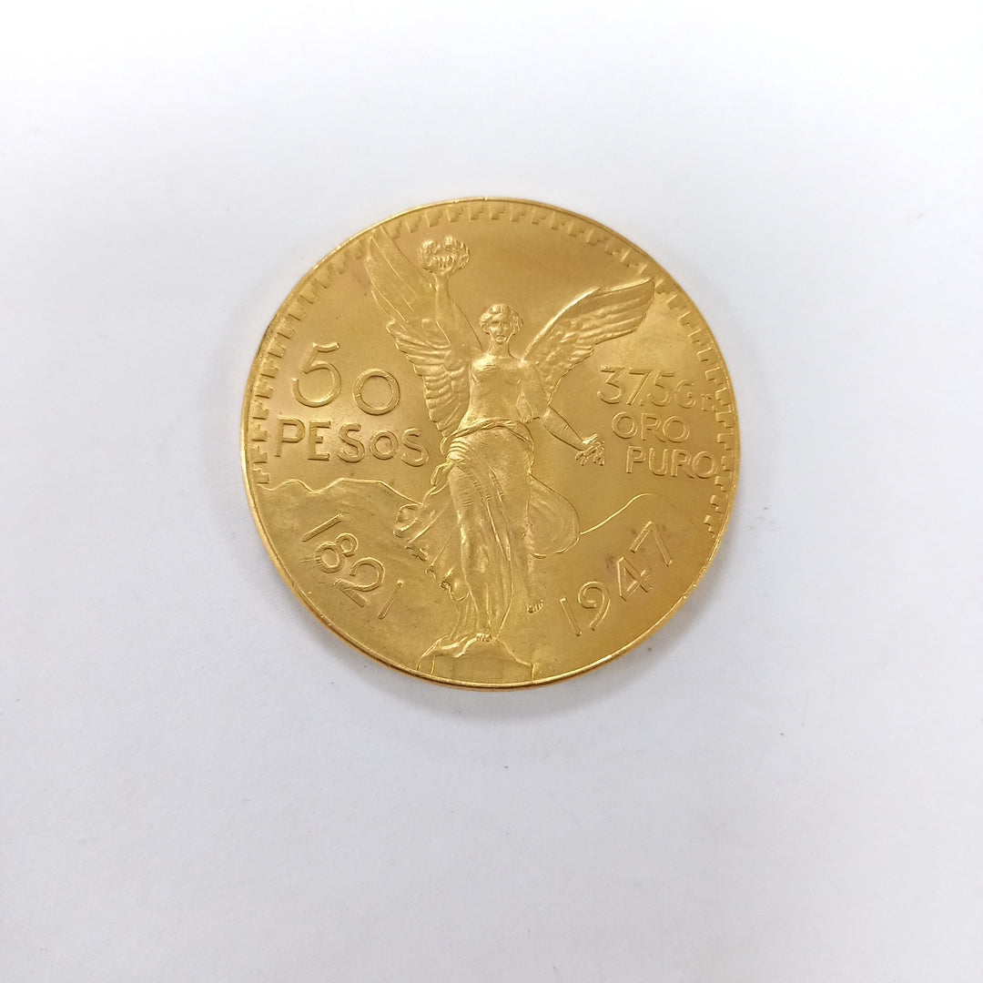 K1 41.6 GRMS - DESC. 0 GRAMOS - 21 K - AVALÚO 71884.8 * * IDENTIFICACIÓN MONEDA NOMINATIVA. * MONEDAS PESOS 50 PESO (SEMINUEVO)