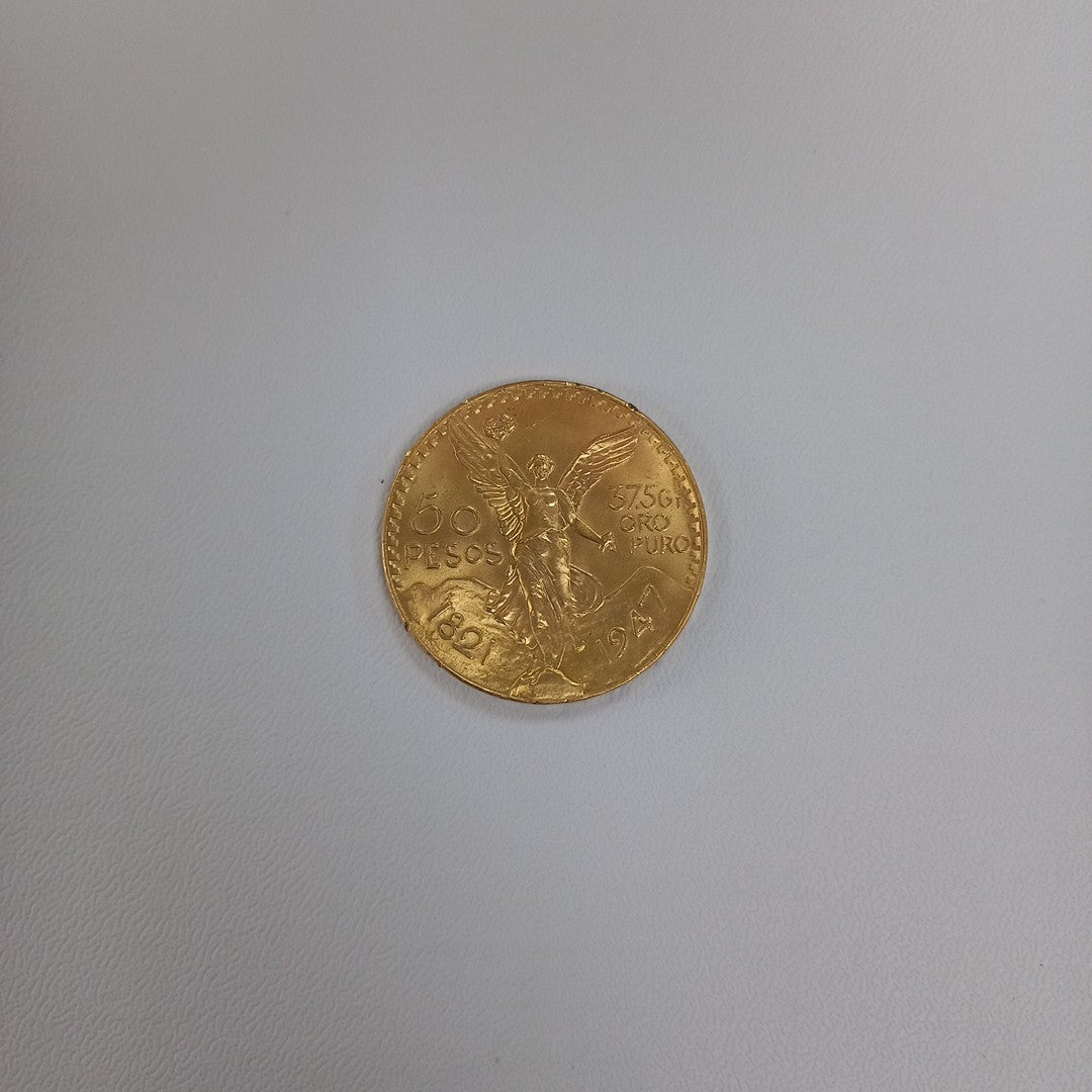 K1 41.6 GRMS - DESC. 0 GRAMOS - 21 K - AVALÚO 75254.4 * * IDENTIFICACIÓN MONEDA NOMINATIVA. * MONEDAS PESOS 50 PESO (SEMINUEVO)