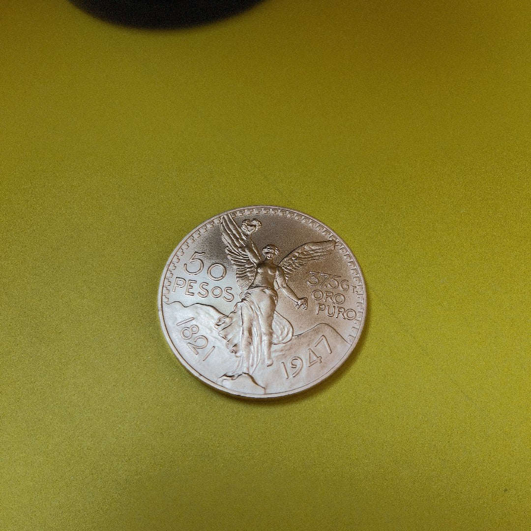 K1 41,60 GRMS - DTO. 0,00 GRMS - 21 K - AVALÚO 75894,21 * IDENTIFICACIÓN MONEDA NOMINATIVA * MONEDAS PESOS 50 PESOS (SEMINUEVO)