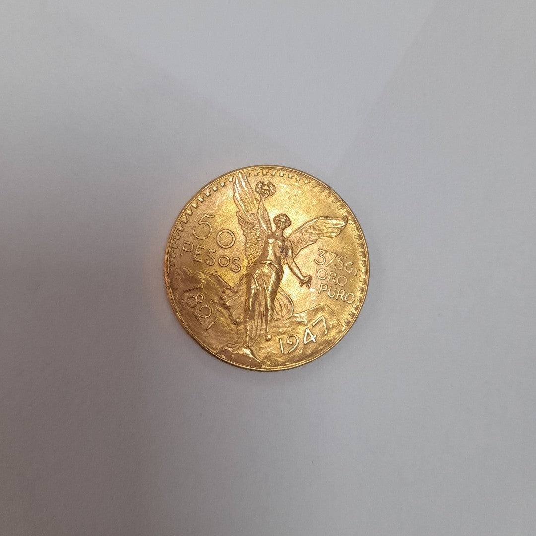 K1 41,60 GRMS - DTO. 0,00 GRMS - 21 K - AVALÚO 79534,21 * IDENTIFICACIÓN MONEDA NOMINATIVA * MONEDAS PESOS 50 PESOS (SEMINUEVO)