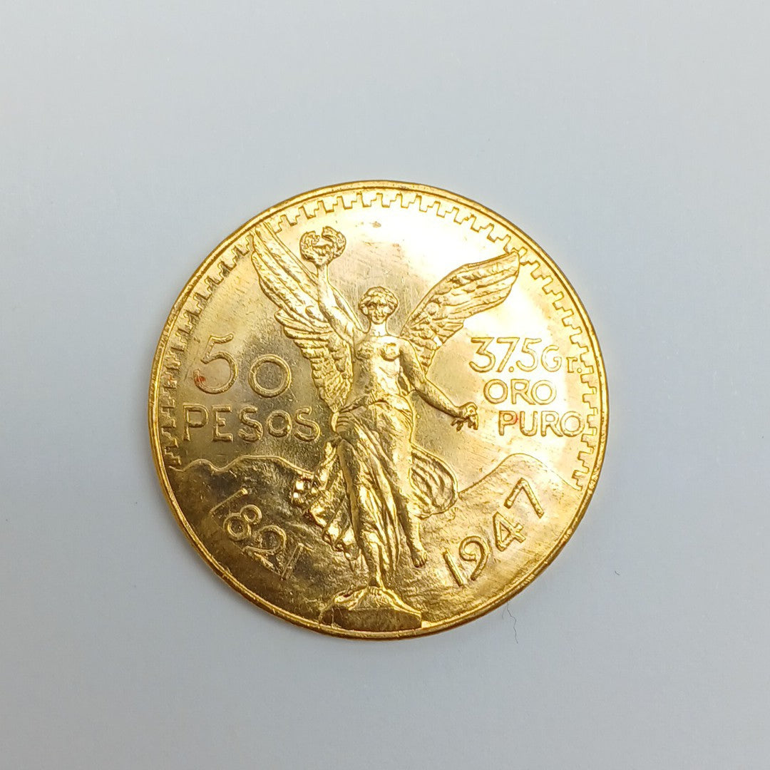 K1 41,60 GRMS - DTO. 0,00 GRMS - 21 K - AVALÚO 77126,40 * IDENTIFICACIÓN MONEDA NOMINATIVA * MONEDAS PESOS 50 PESOS (SEMINUEVO)