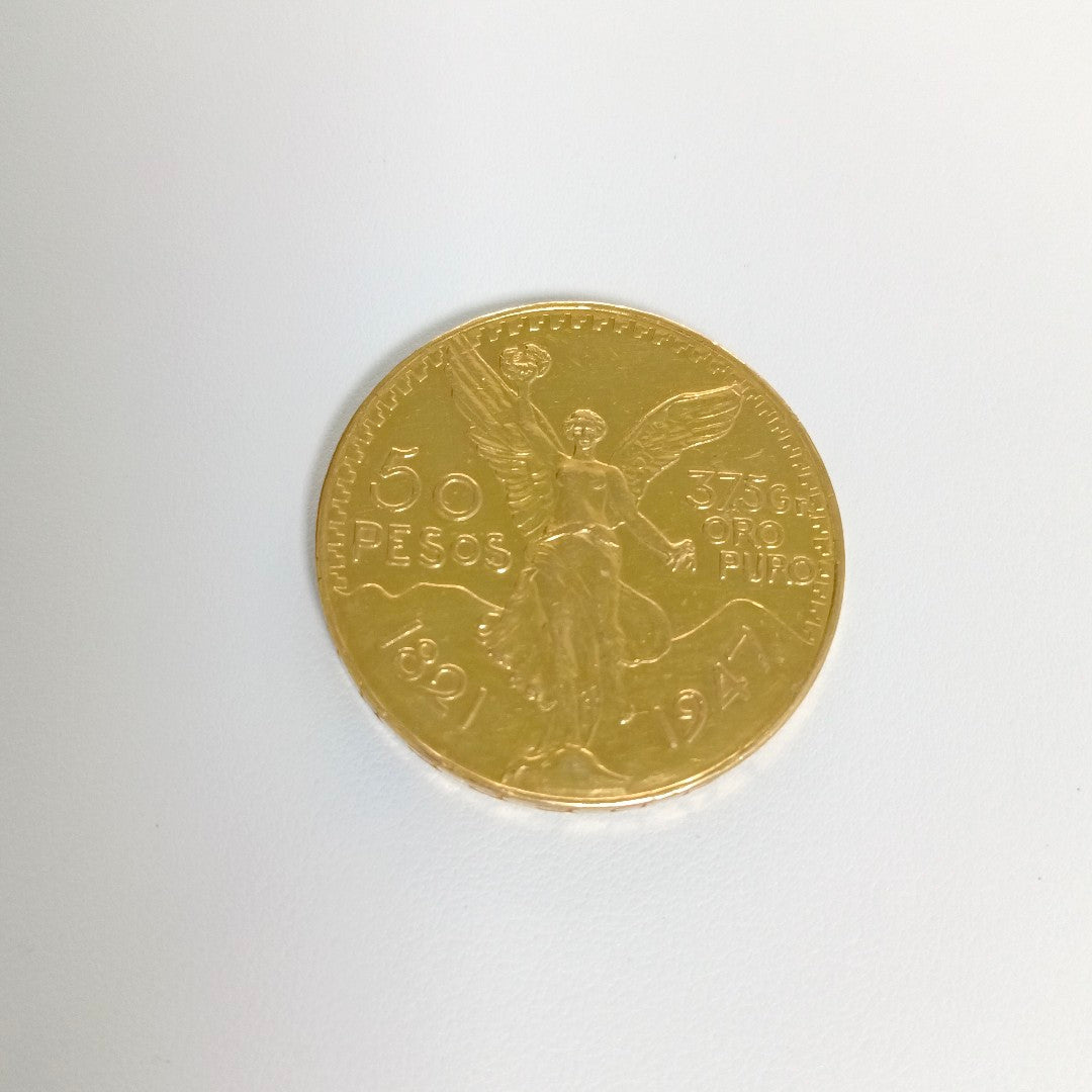 K1 41,60 GRMS - DTO. 0,00 GRMS - 21 K - AVALÚO 79534,21 * IDENTIFICACIÓN MONEDA NOMINATIVA * MONEDAS PESOS 50 PESOS (SEMINUEVO)