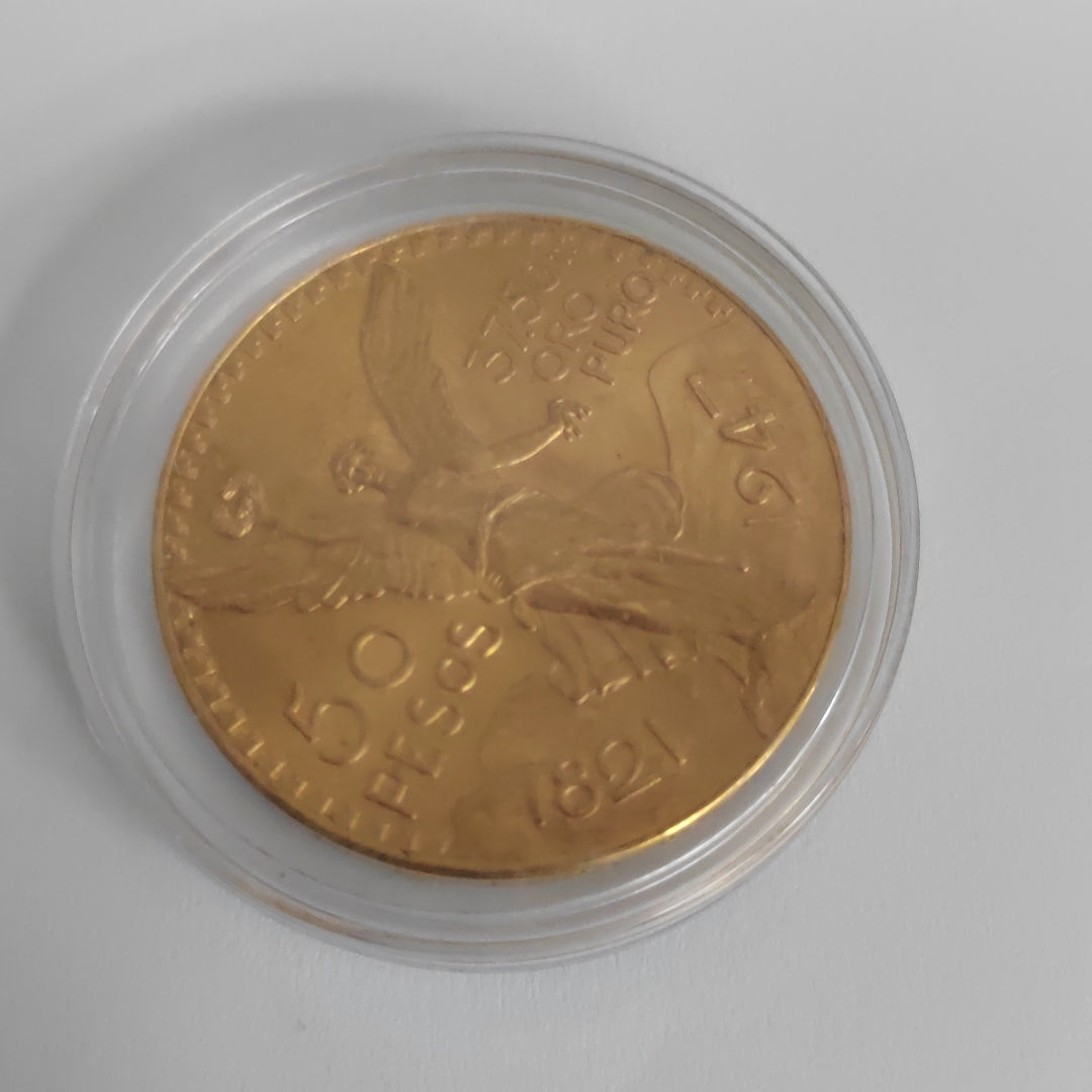 K1 41,60 GRMS - DTO. 0,00 GRMS - 21 K - AVALÚO 77126,40 * IDENTIFICACIÓN MONEDA NOMINATIVA * MONEDAS PESOS 50 PESOS (SEMINUEVO)