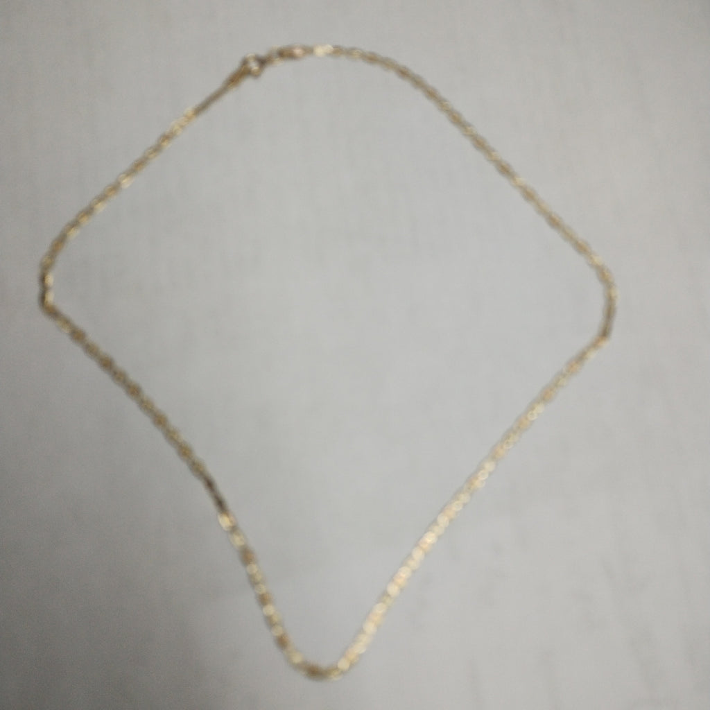 CADENA. ORO COMBINADO. 10 K 2 GRMS (SEMINUEVO)