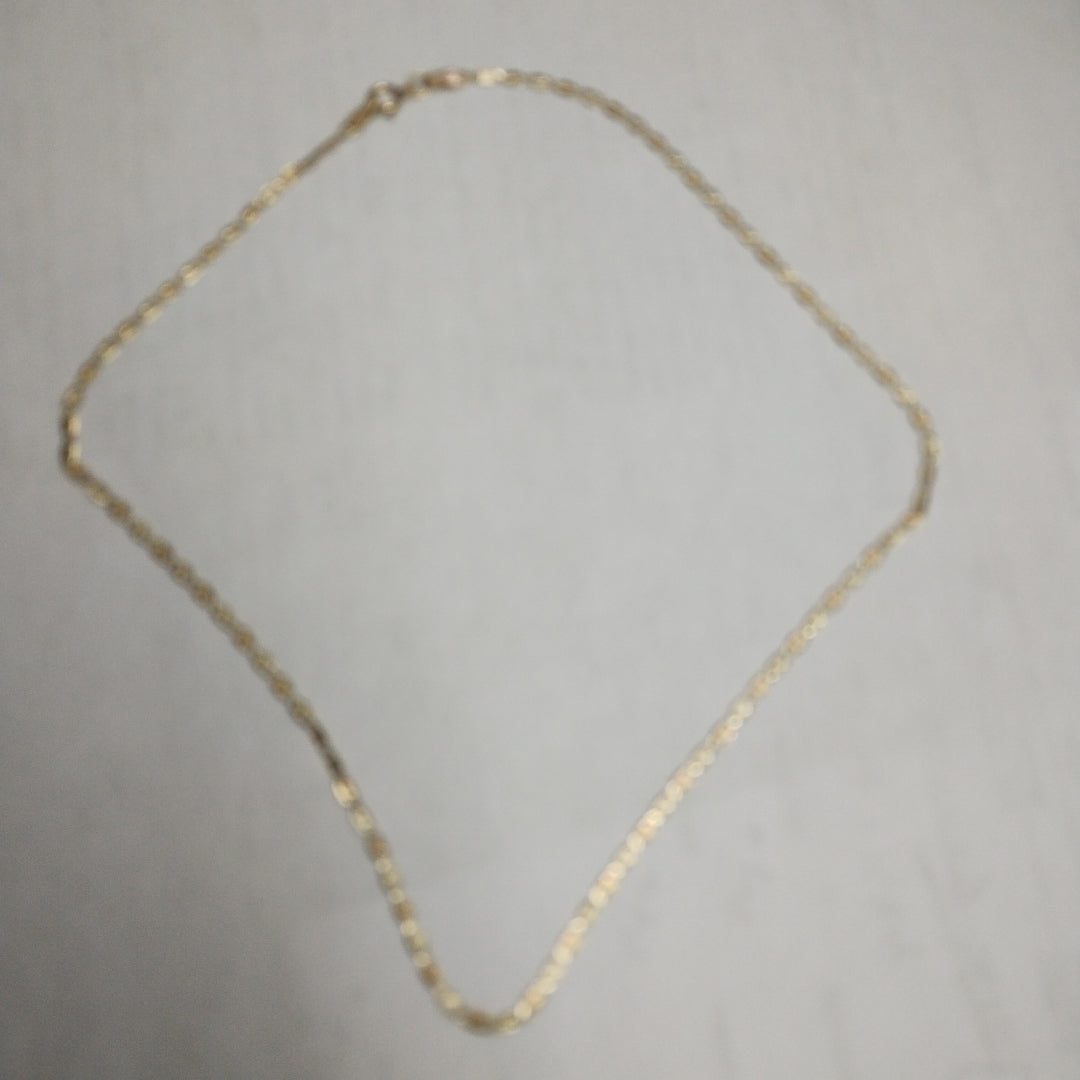 CADENA. ORO COMBINADO. 10 K 2 GRMS (SEMINUEVO)