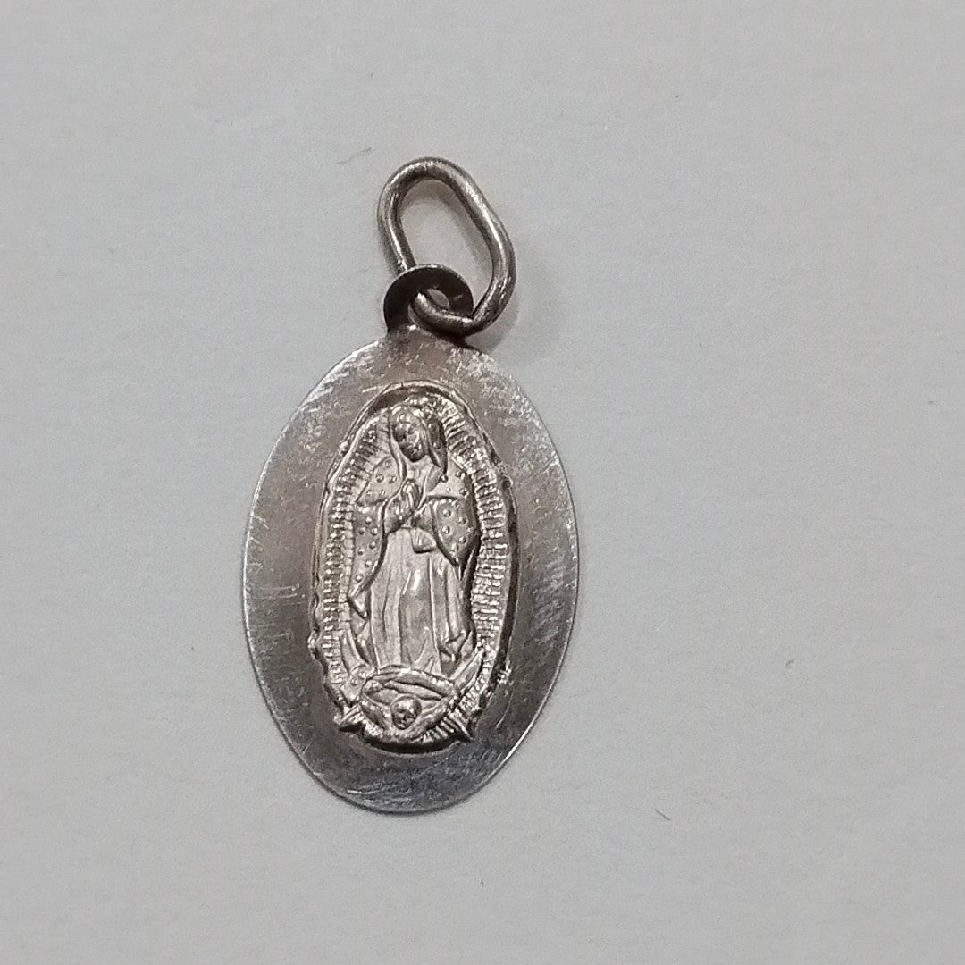 DIJE. ORO. 14 K 0.7 GRMS (SEMINUEVO)