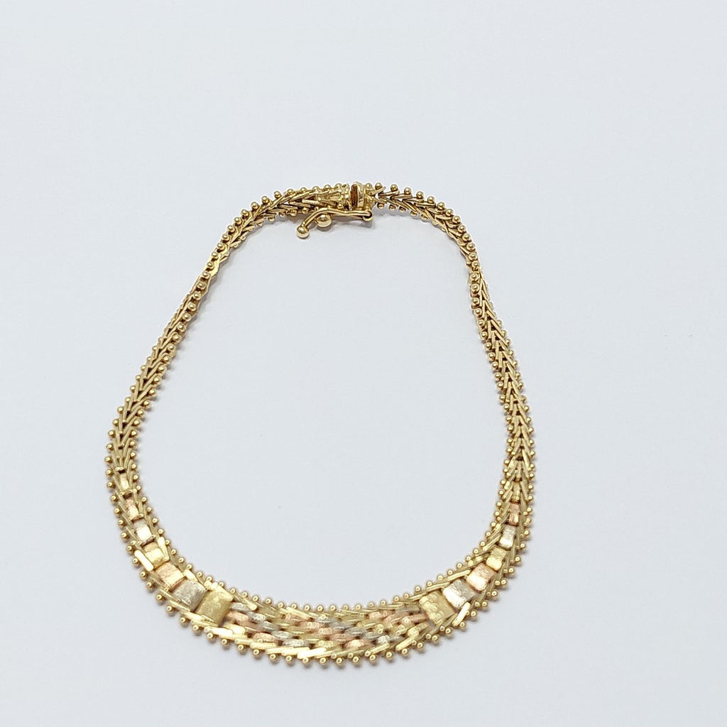 PULSERA. ORO COMBINADO. 14 K 7.9 GRMS (SEMINUEVO)