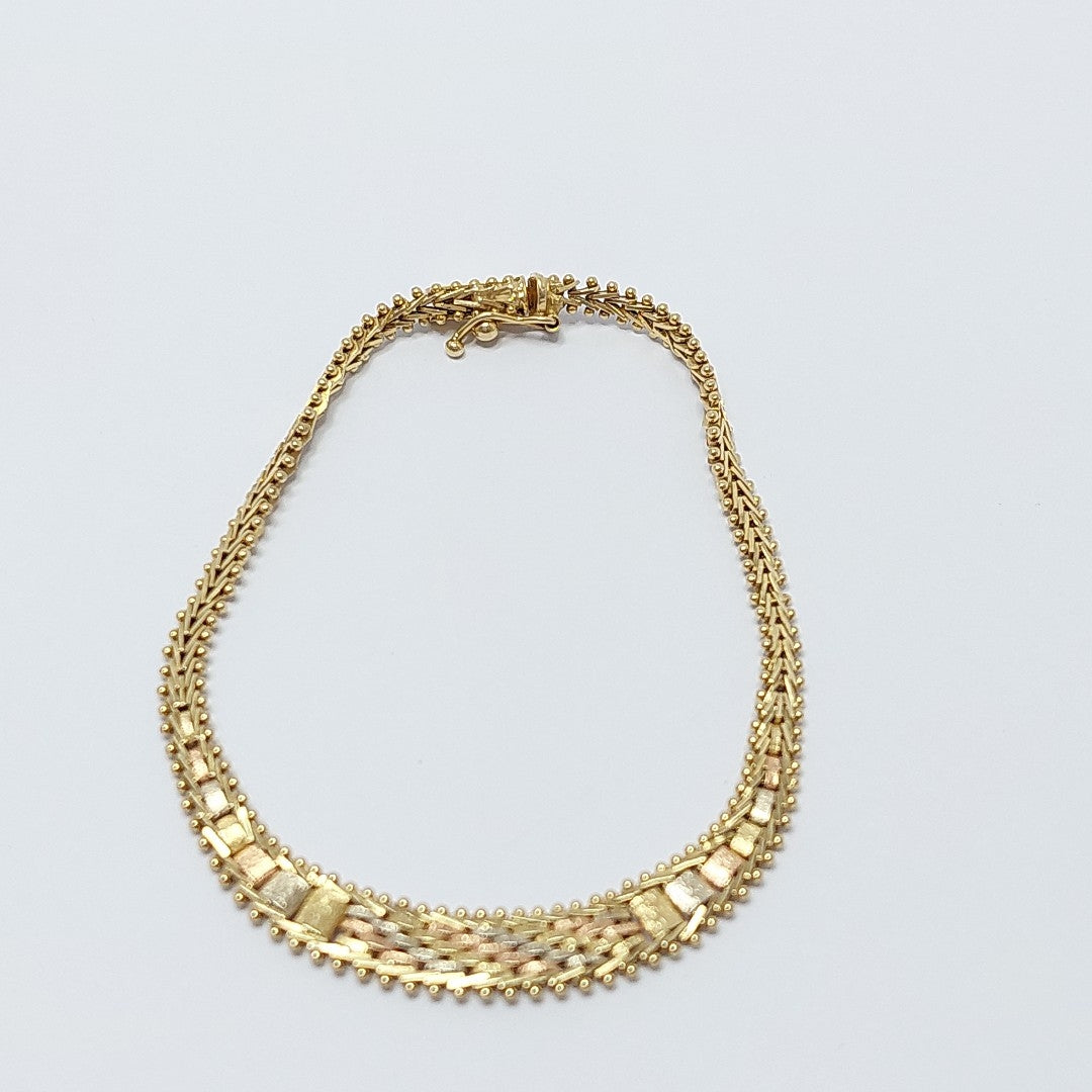 PULSERA. ORO COMBINADO. 14 K 7.9 GRMS (SEMINUEVO)