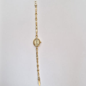 RELOJ CAJA Y PULSO ORO. ORO. 14 K 13.9 GRMS (SEMINUEVO)