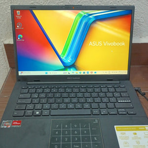 LAPTOP ASUS VIVOBOOK GO 14 E1404FA-NK209W (2023) 512 GB SSD 16 GB RAM (SEMINUEVO)