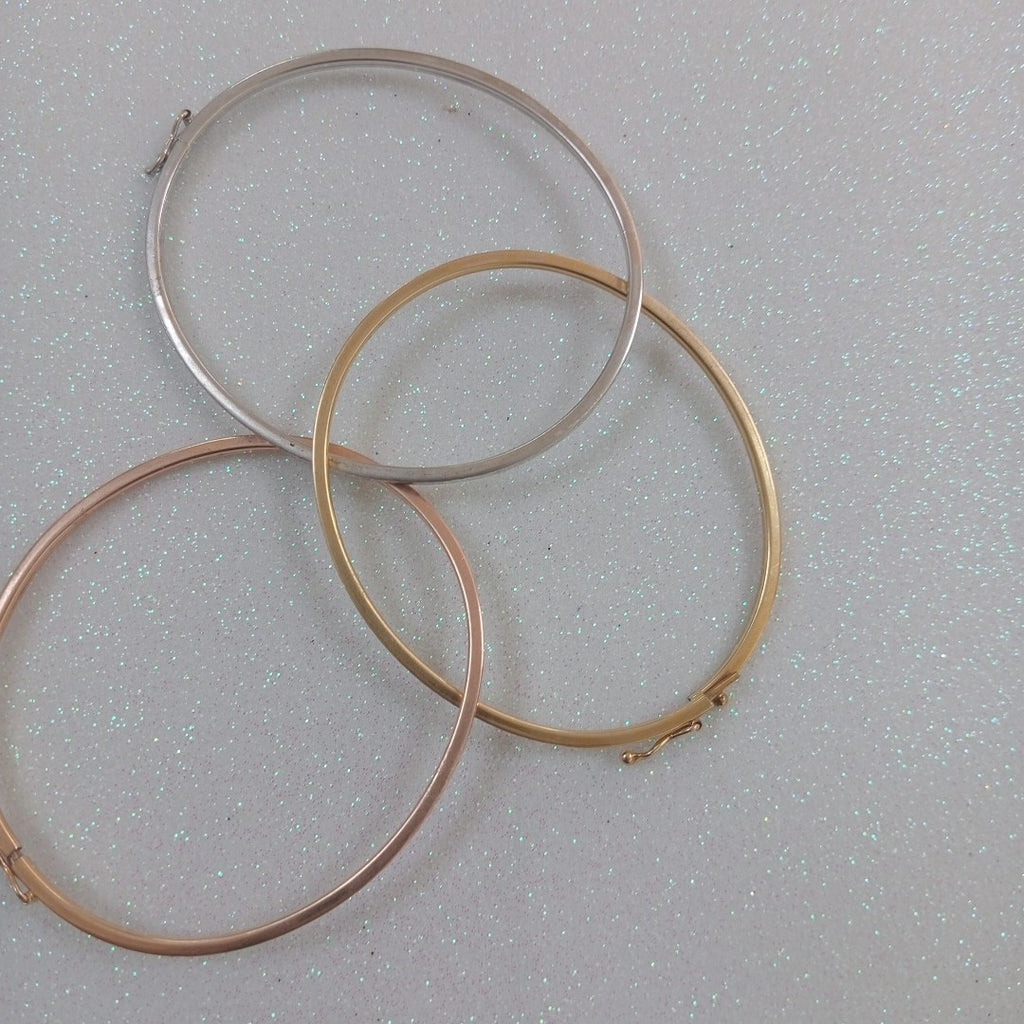 PULSERA RIGIDA ORO COMBINADO 14 K 8,80 GRMS (SEMINUEVO)