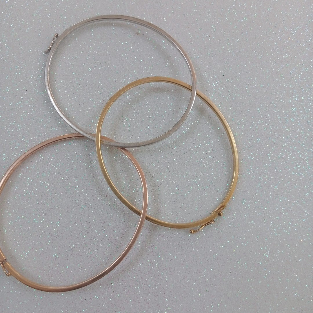 PULSERA RIGIDA ORO COMBINADO 14 K 8,80 GRMS (SEMINUEVO)