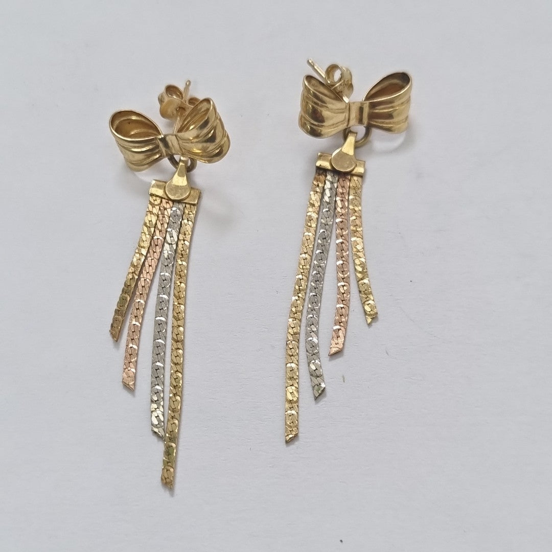 ARETES PAR. ORO, ORO COMBINADO. 14 K 2.9 GRMS (SEMINUEVO)