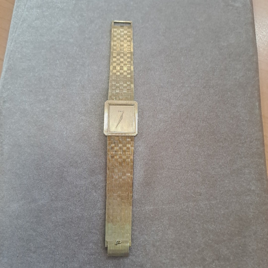 RELOJ CAJA Y PULSO ORO. ORO. 18 K 68.6 GRMS (SEMINUEVO)