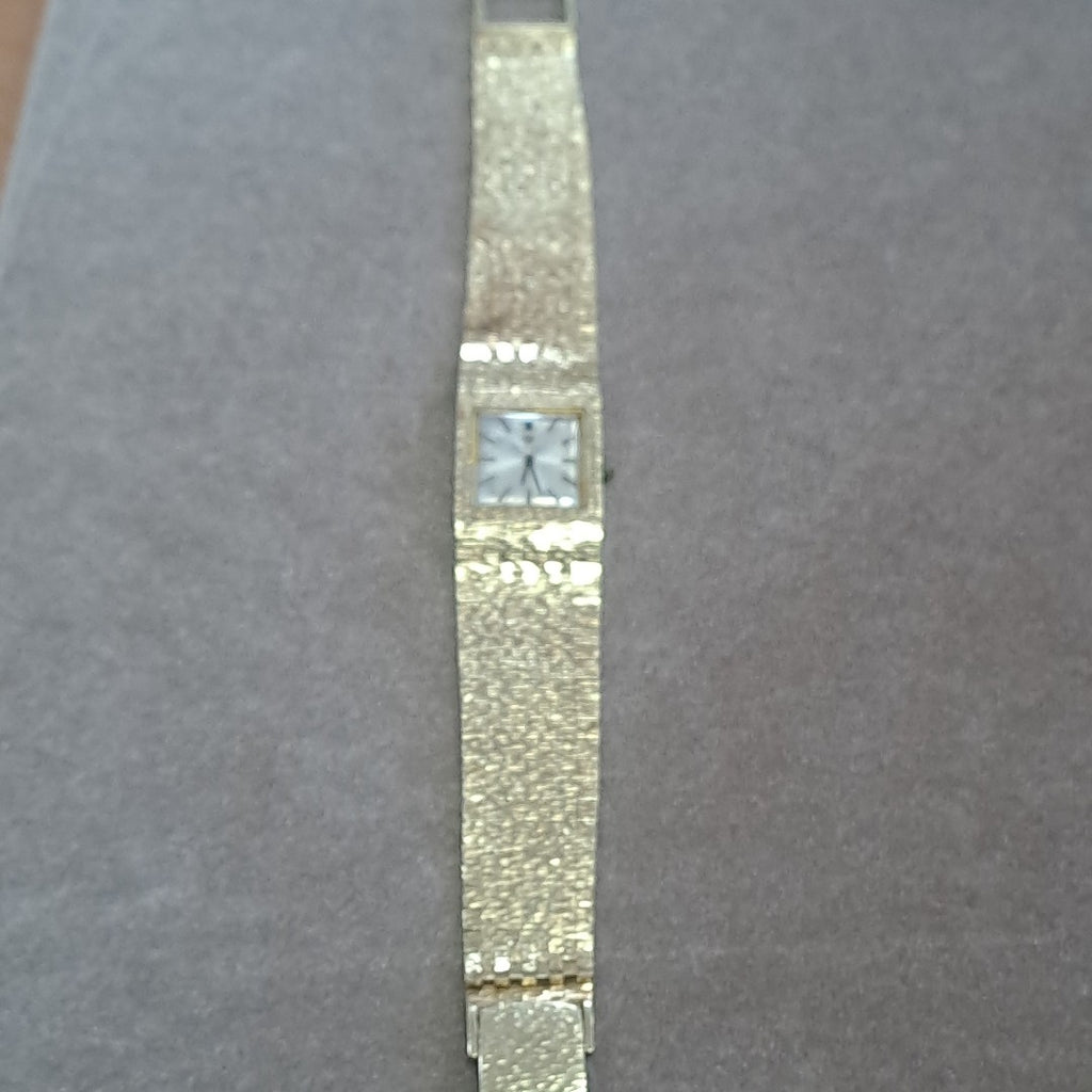 RELOJ CAJA Y PULSO ORO. ORO. 14 K 58.4 GRMS (SEMINUEVO)