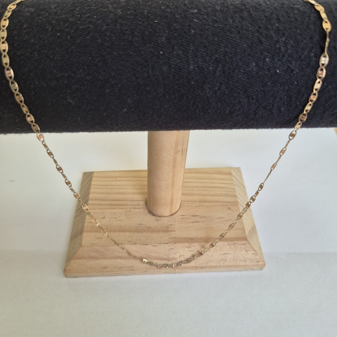 CADENA. ORO, ORO COMBINADO. 10 K 2.1 GRMS (SEMINUEVO)