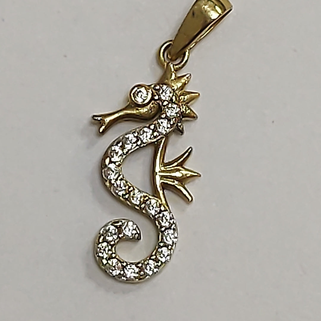 DIJE. ORO. 10 K 0.6 GRMS (SEMINUEVO)