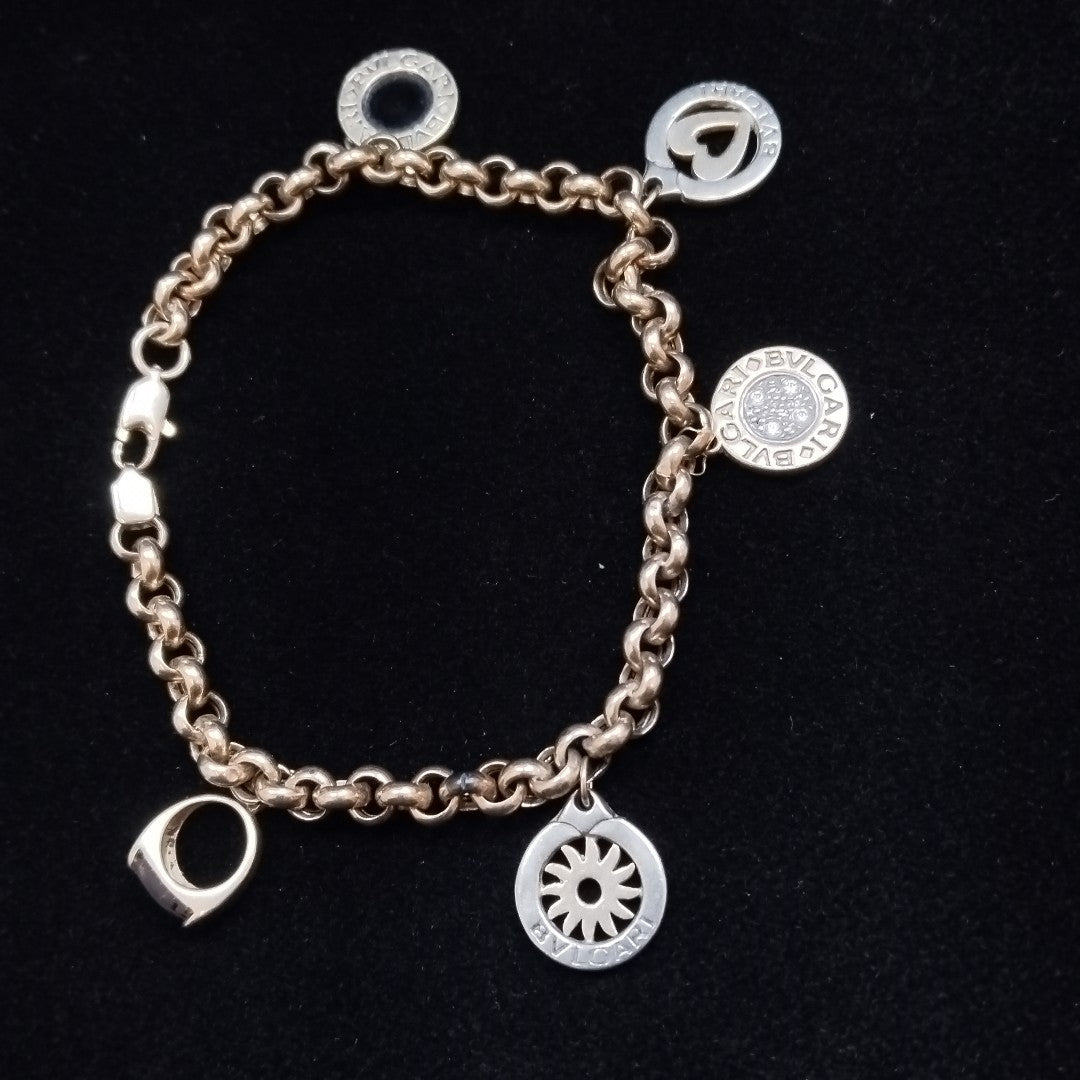 K1 15,30 GRMS 14 K ESPECIFICACIONES COMPLEMENTARIAS PULSERA CON COLGANTES TIPO (SEMINUEVO)