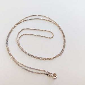 CADENA ORO COMBINADO 14 K 2,60 GRMS (SEMINUEVO)