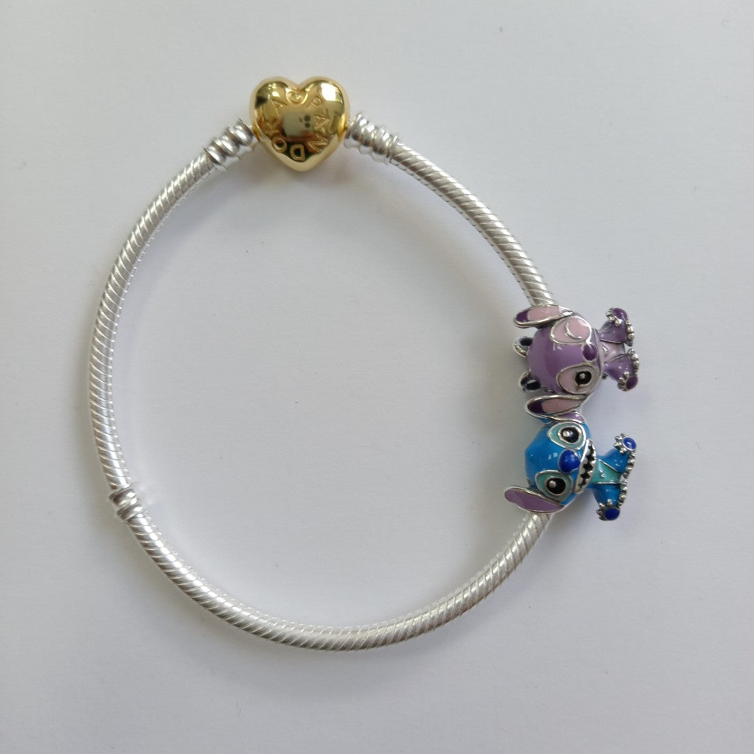 PULSERA TEJIDO ARTICULADA CON CHARMS PLATA .925 18 CM 19.1 GR (NUEVO)