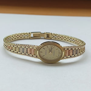 RELOJ CAJA Y PULSO ORO ORO COMBINADO 14 K 21 GRMS (SEMINUEVO)