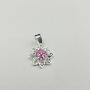 DIJE FLOR CON PIEDRA ROSA PLATA .925 2.1 GR (NUEVO)