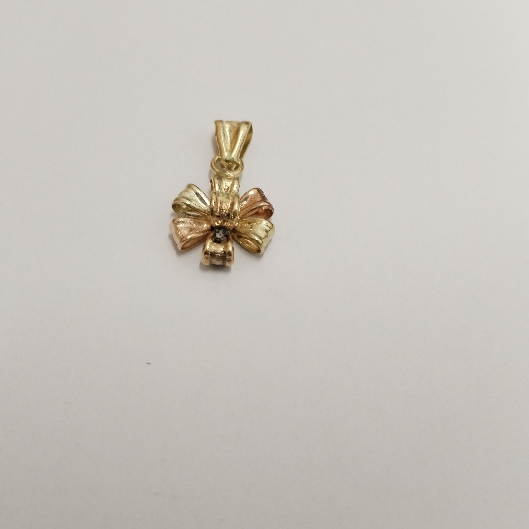 DIJE ORO, ORO COMBINADO 10 K 0.9 GRMS (SEMINUEVO)