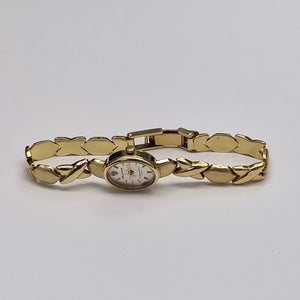 RELOJ CAJA Y PULSO ORO ORO 14 K 17.4 GRMS (SEMINUEVO)