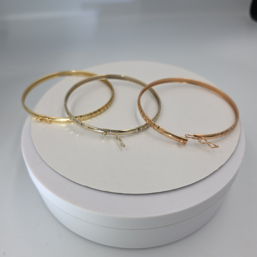 PULSERA RIGIDA ORO COMBINADO 14 K 12.8 GRMS (SEMINUEVO)