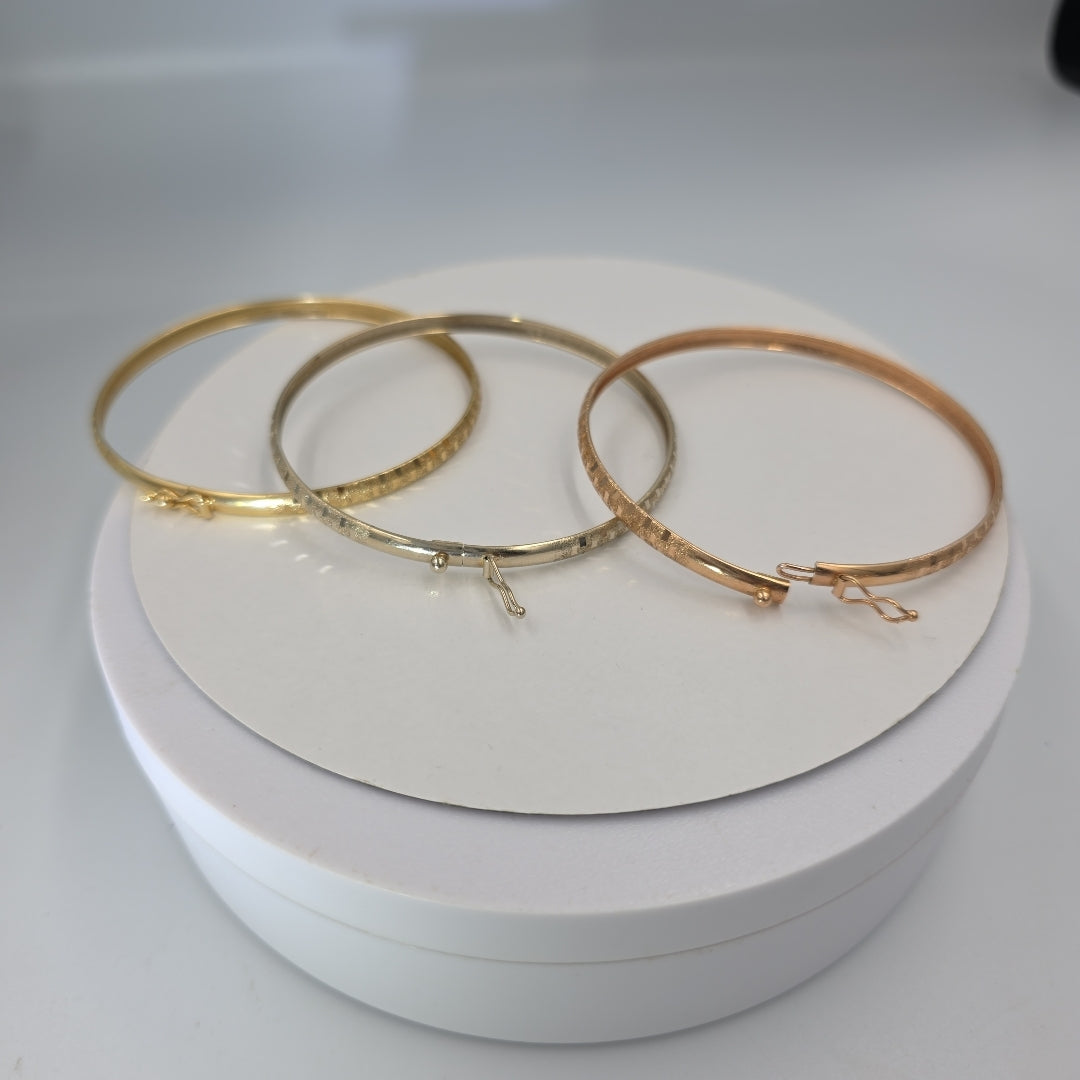 PULSERA RIGIDA ORO COMBINADO 14 K 12.8 GRMS (SEMINUEVO)