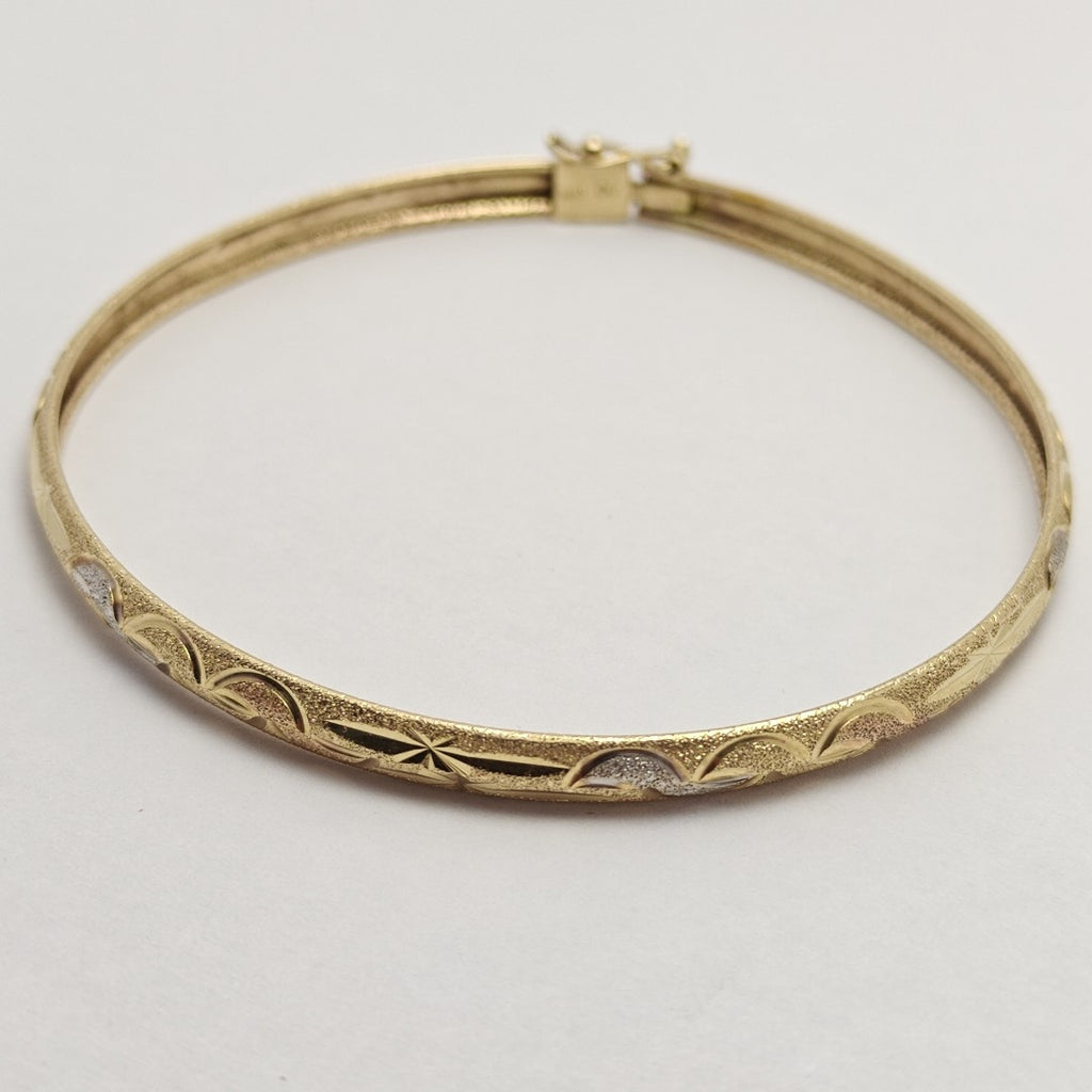 PULSERA RIGIDA ORO COMBINADO 14 K 5.4 GRMS (SEMINUEVO)