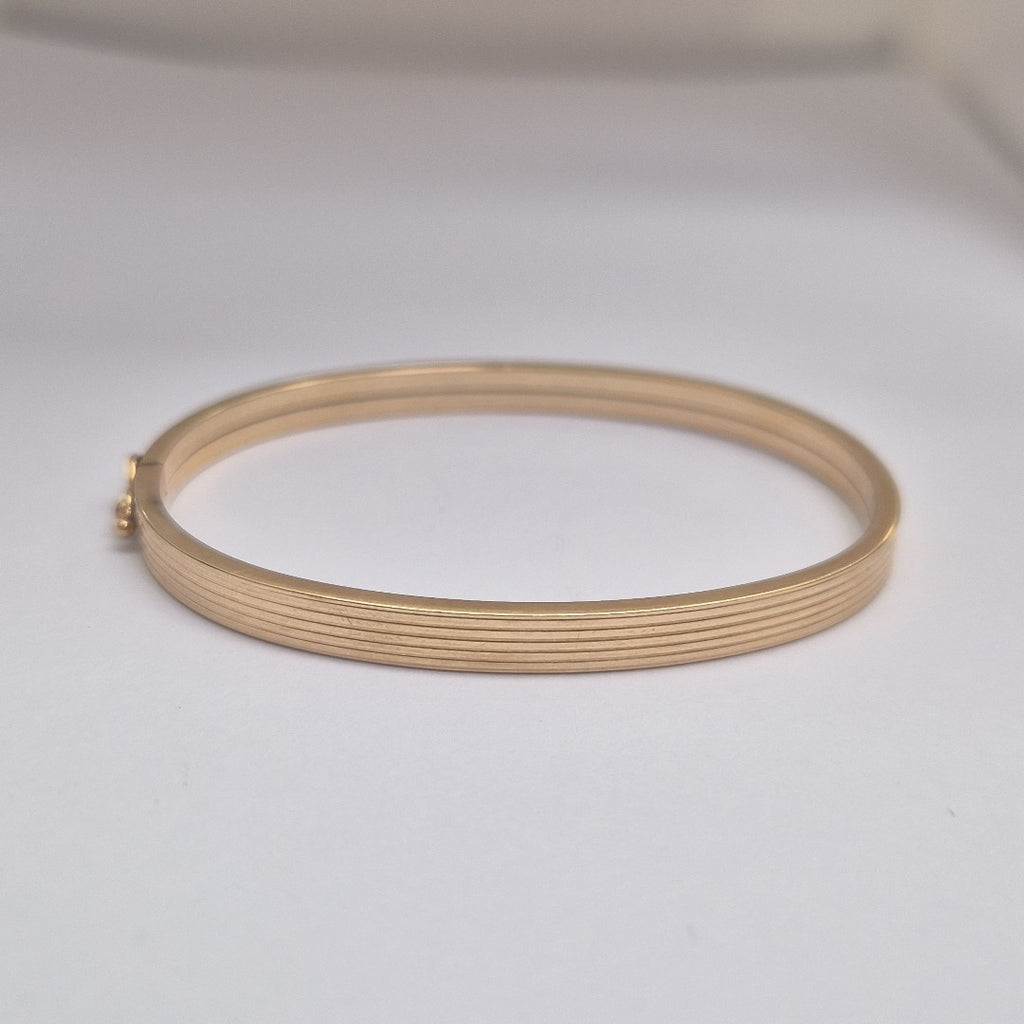 PULSERA RIGIDA ORO 10 K 8,50 GRMS (SEMINUEVO)