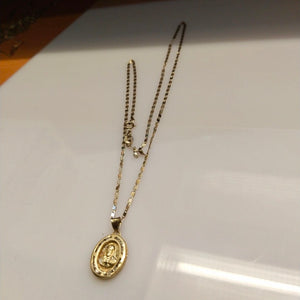 CADENA, MEDALLA RELIGIOSA ORO 10 K 2.4 GRMS (SEMINUEVO)