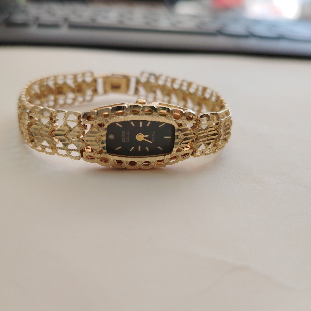 RELOJ CAJA ACERO PULSO ORO ORO 14 K 21.3 GRMS (SEMINUEVO)