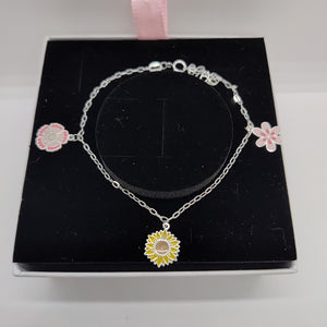 PULSERA TEJIDO ESPECIAL CON DIJE FLORES PLATA .925 21 CM 2.3 GR (NUEVO)