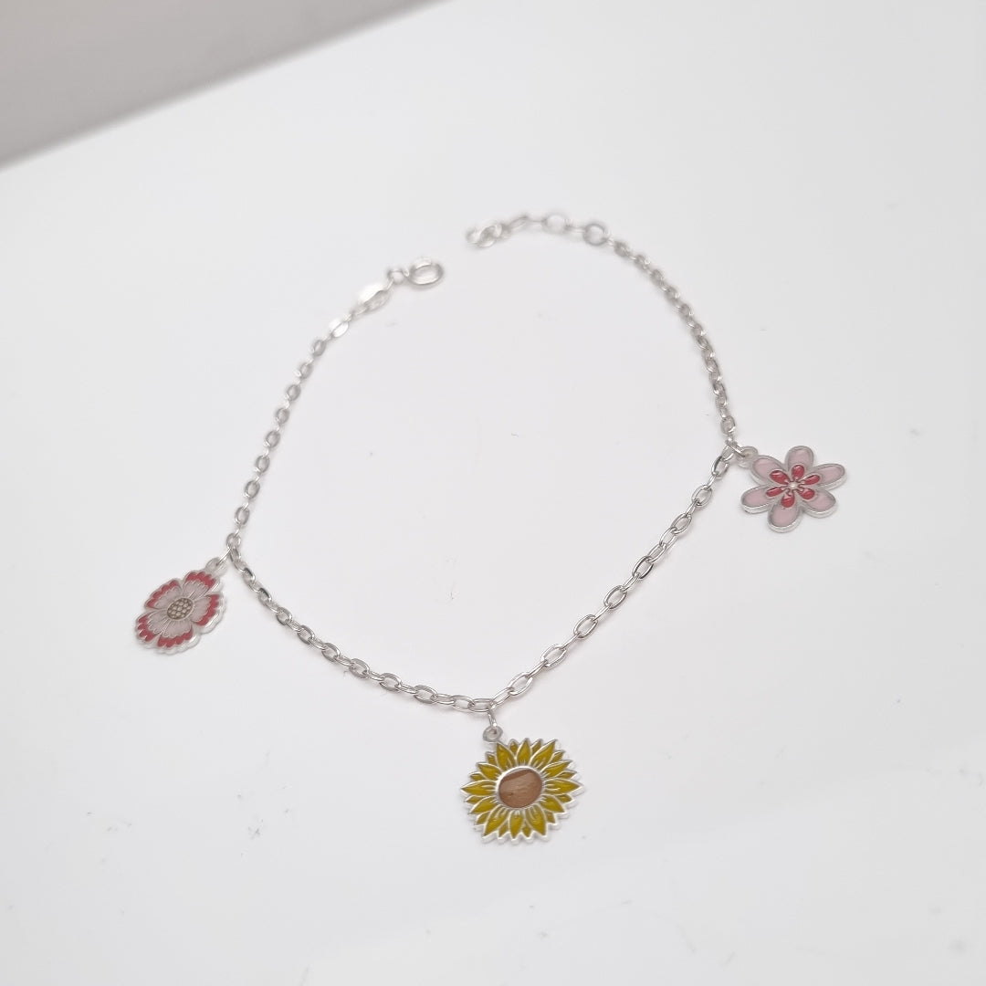 PULSERA TEJIDO ESPECIAL CON DIJE FLORES PLATA .925 21 CM 2.3 GR (NUEVO)