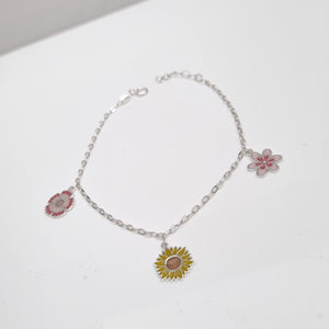 PULSERA TEJIDO ESPECIAL CON DIJE FLORES PLATA .925 21 CM 2.3 GR (NUEVO)