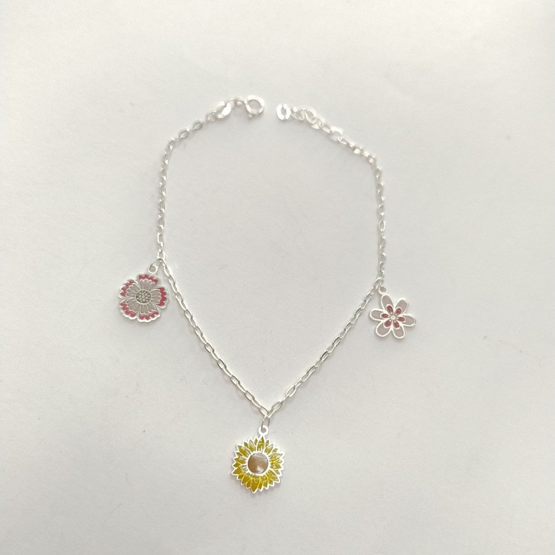 PULSERA TEJIDO ESPECIAL CON DIJE FLORES PLATA .925 21 CM 2.3 GR (NUEVO)